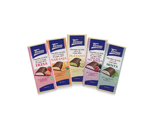 Caramels Tirma de sabores canarios (fresa, naranja, plátano, menta) en paquete de 5, con envoltorios coloridos.